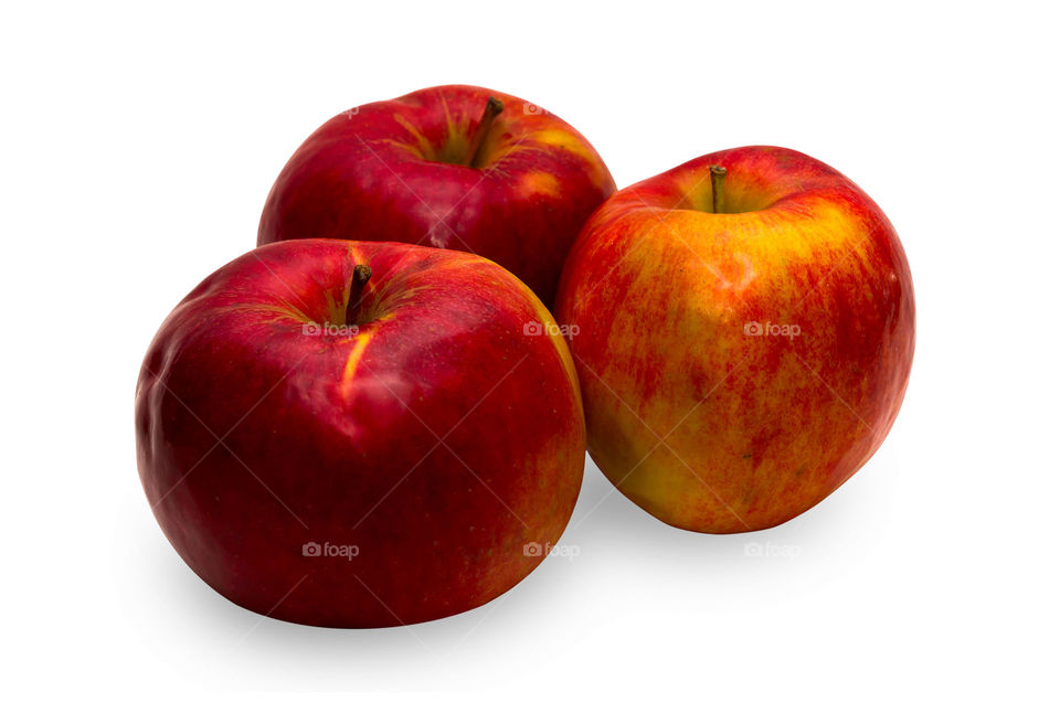 Three red apples