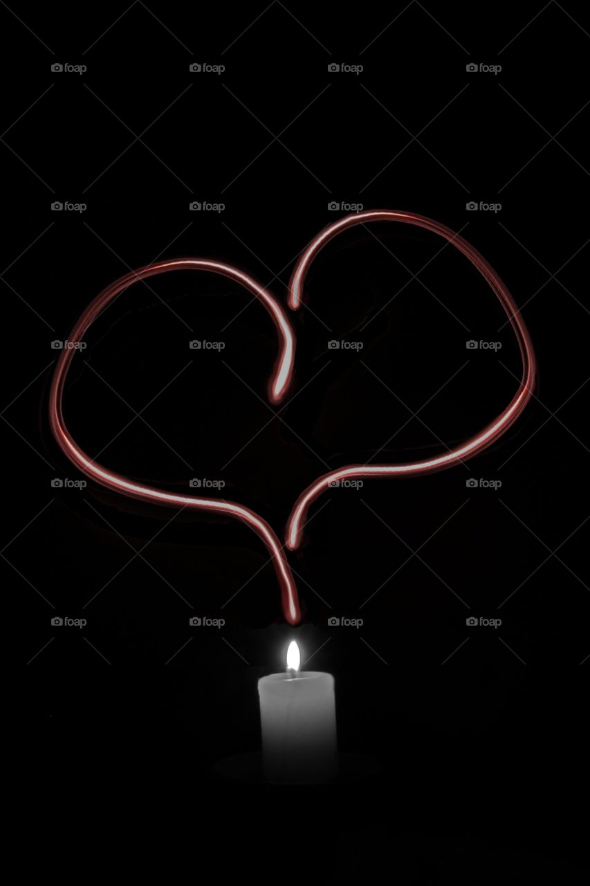 Black and white candle with pink heart