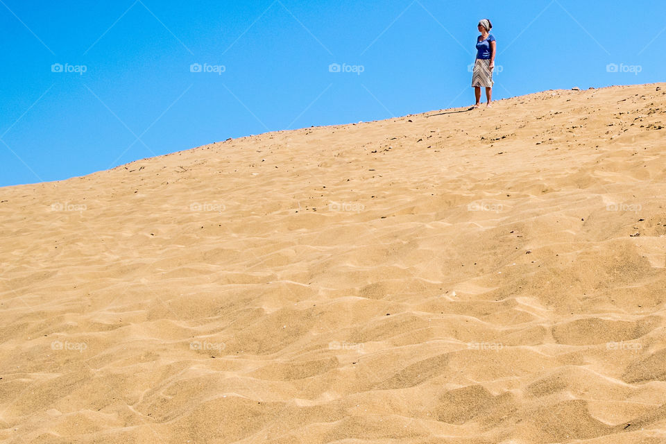 Woman In Desert Landscape
