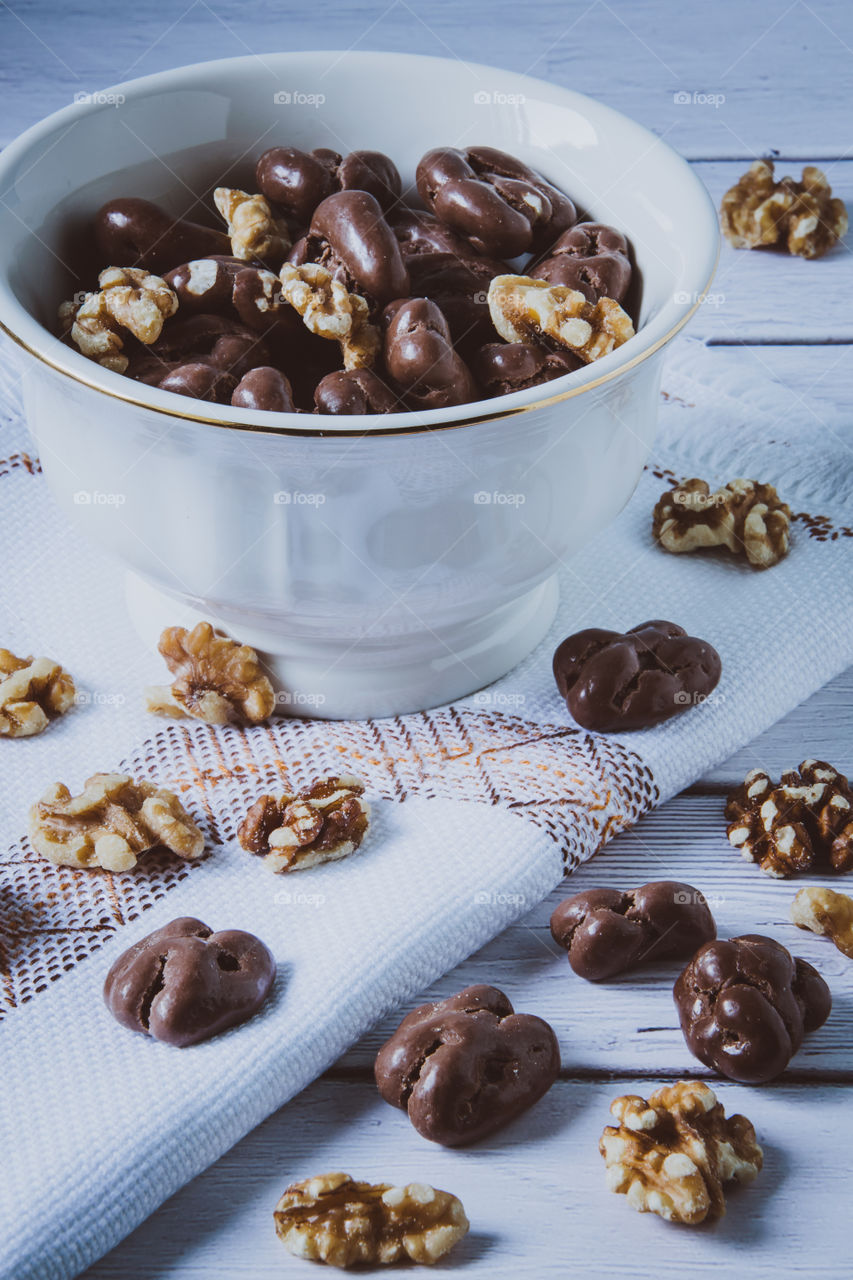 Angle view of chocolate covered walnuts