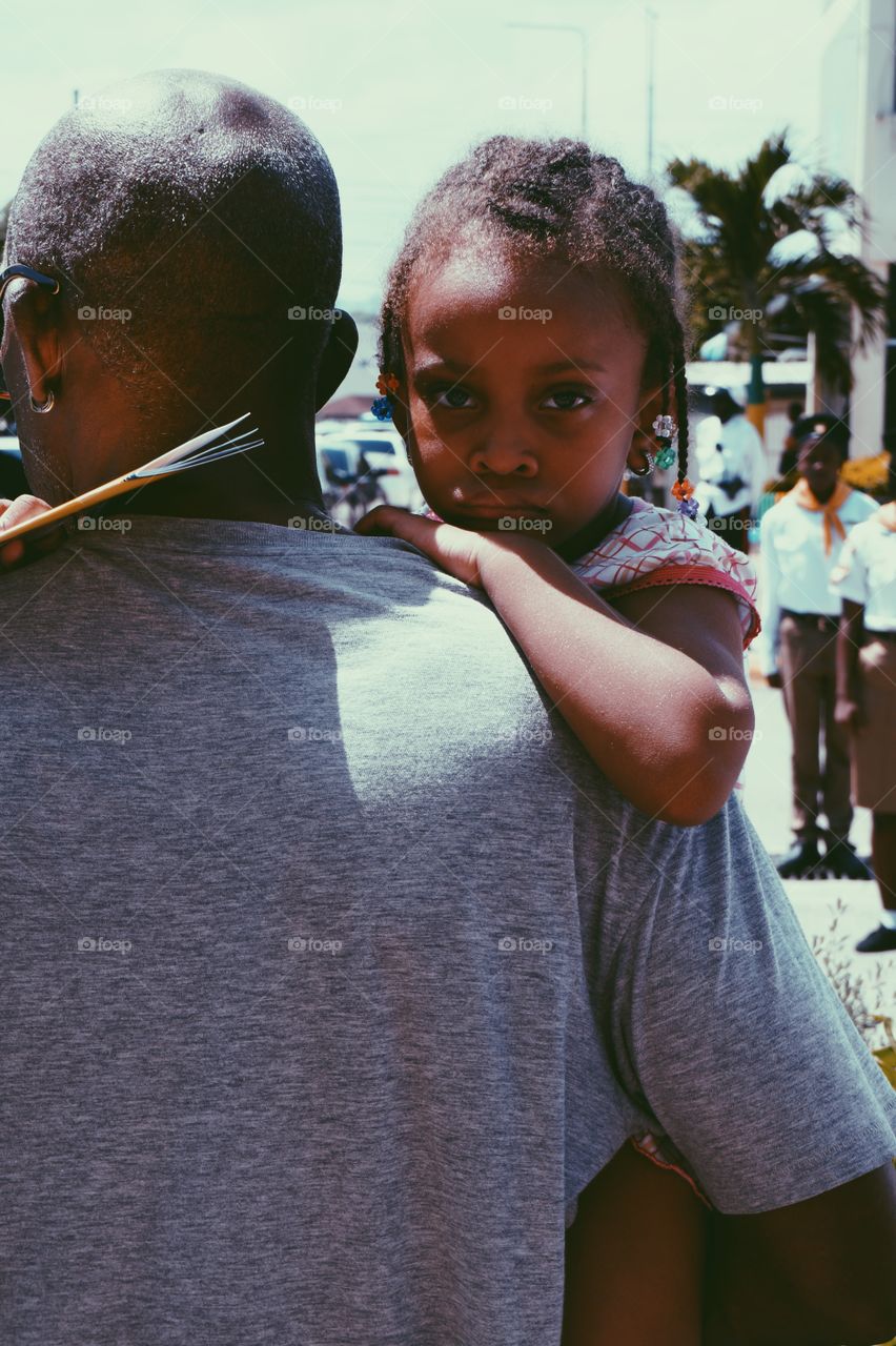 Close-up of a cute african girl with her father