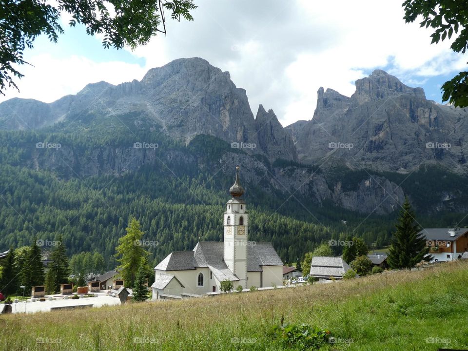 Village Church and Dolomite Mountains