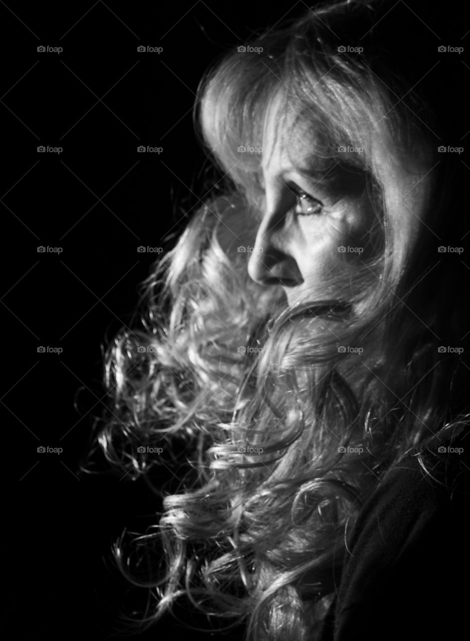 Black and white portrait of a woman’s face and hair