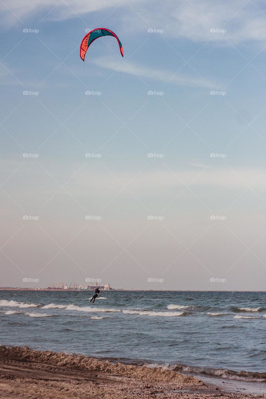 guy kitesurfing on the black sea