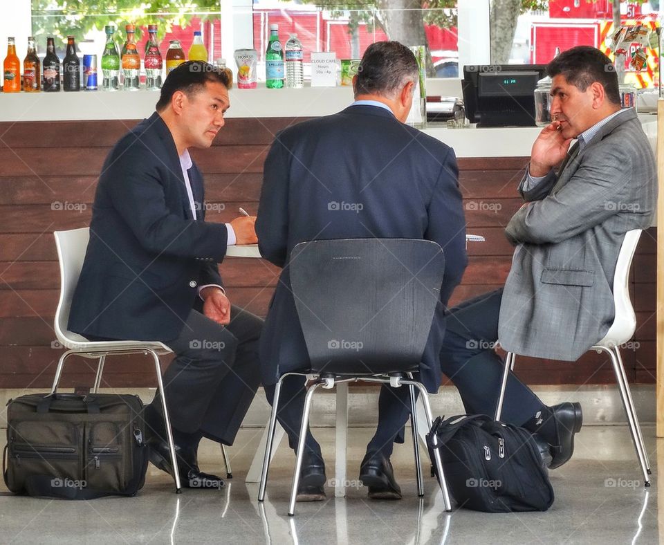 Businessmen at a lunch meeting