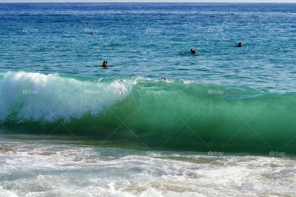 wave rolling in on beach in Alanya turkey