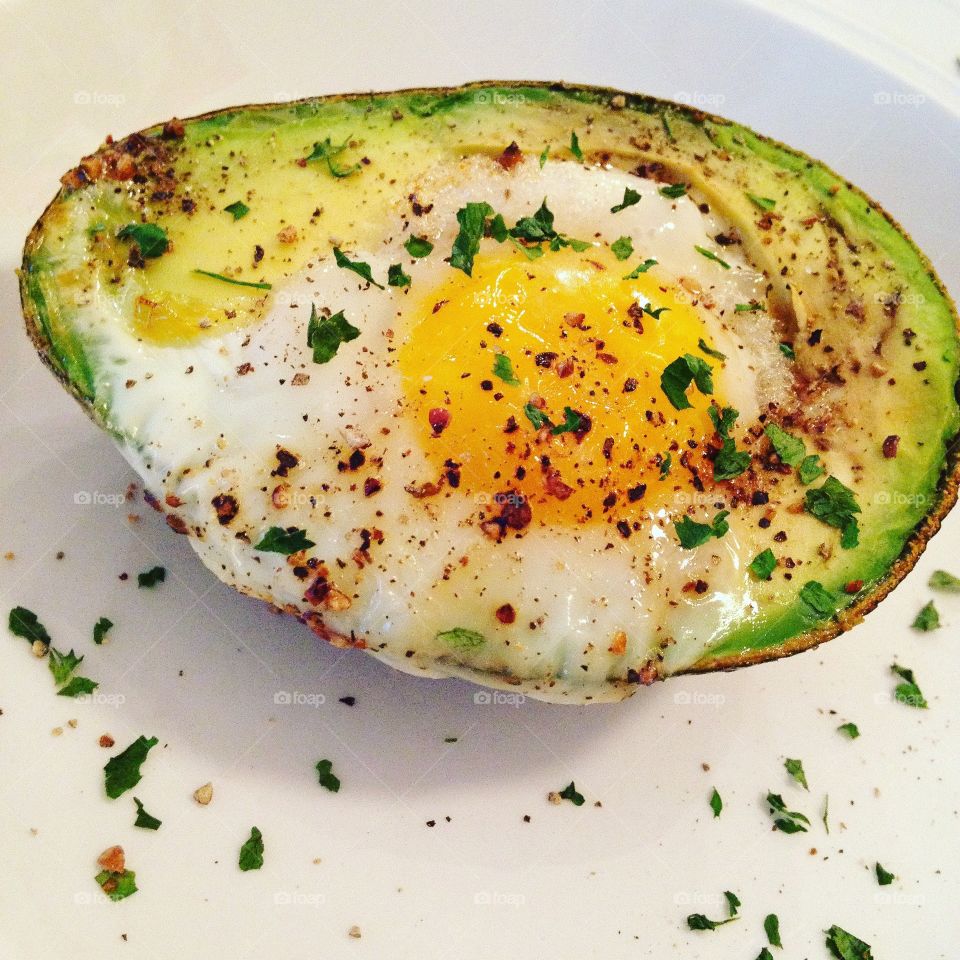 Baked egg in an avocado with salt, fresh ground pepper and dried parsley. Bake at 350 degrees! 