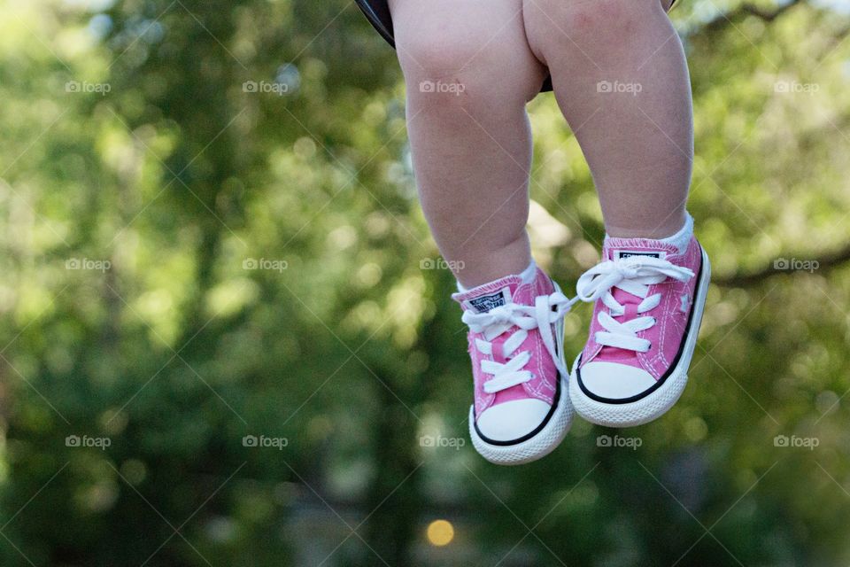Swinging shoes. My daughter loves to swing. I love how her legs represent toddlerhood with the rolls and scrapes.