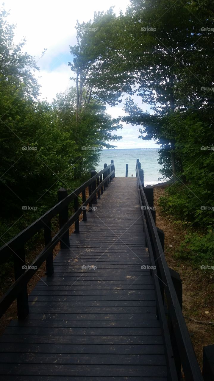 wooden path to lake superior beach