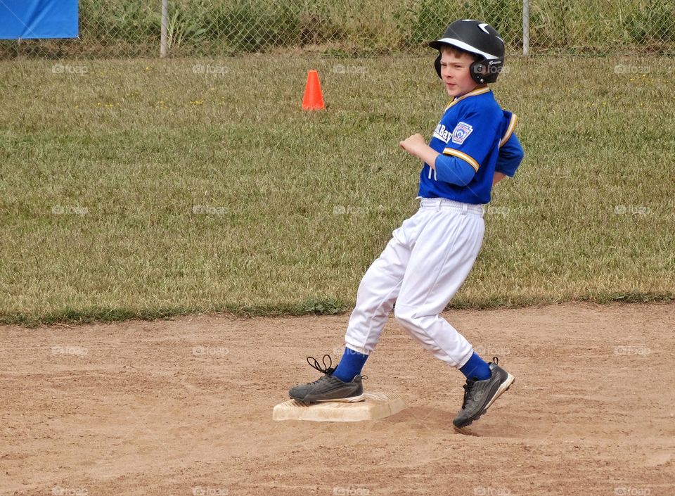 Love Running. Young Baseball Runner
