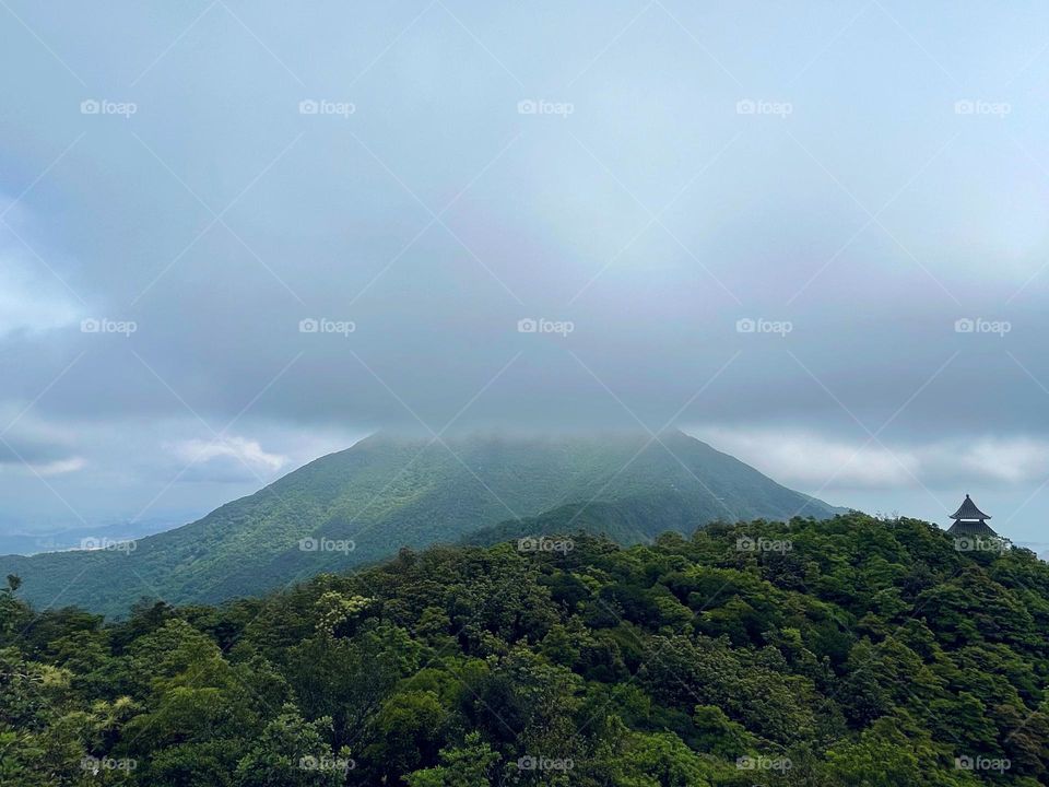 surrounded by clouds