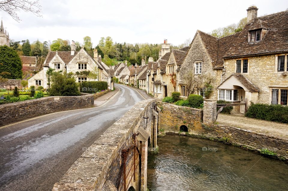 Castle Combe ancient village in the middle of Cotswolds Hills of UK