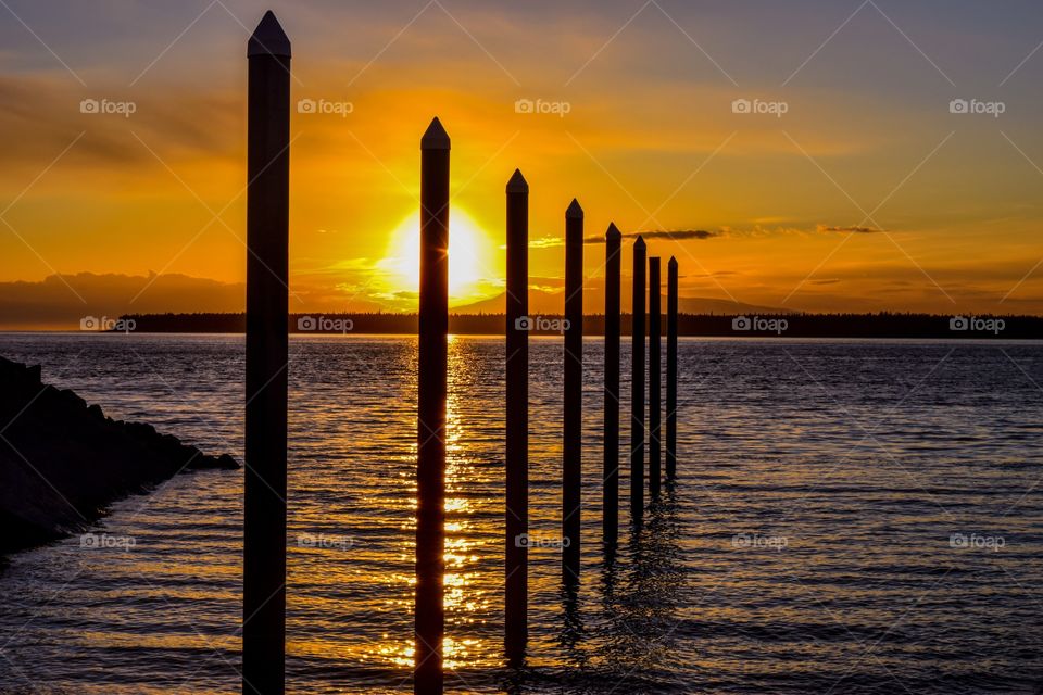 Beautiful sunset taken down by a small boat launch in Anchorage, Alaska