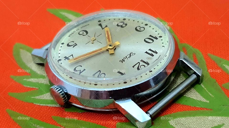 Soviet watch 'Zim' on red USSR flag