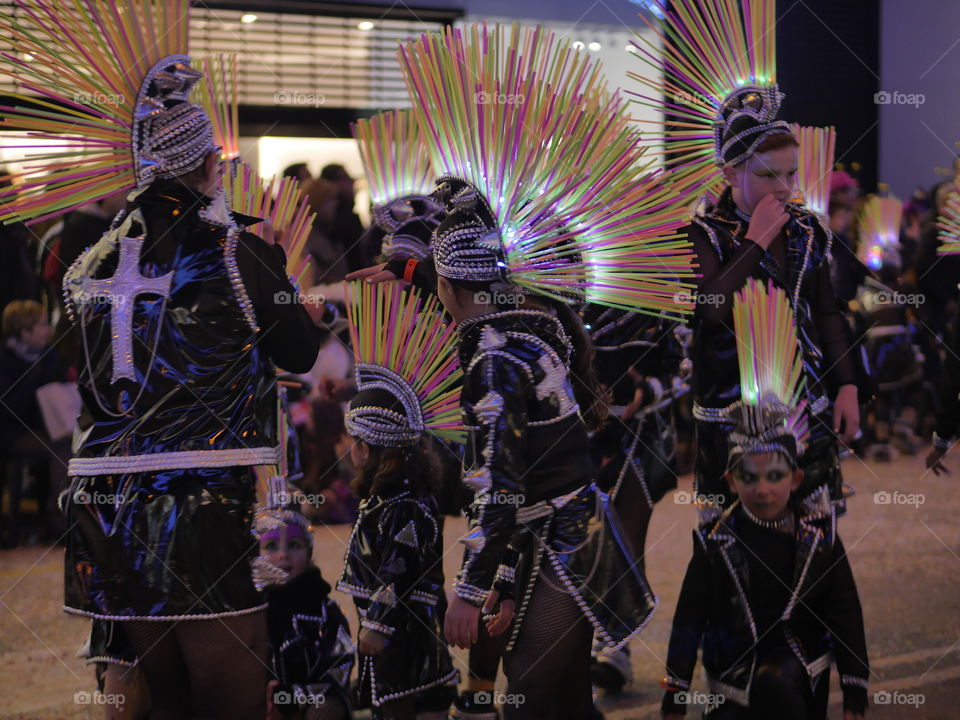 Dance performer standing together at night