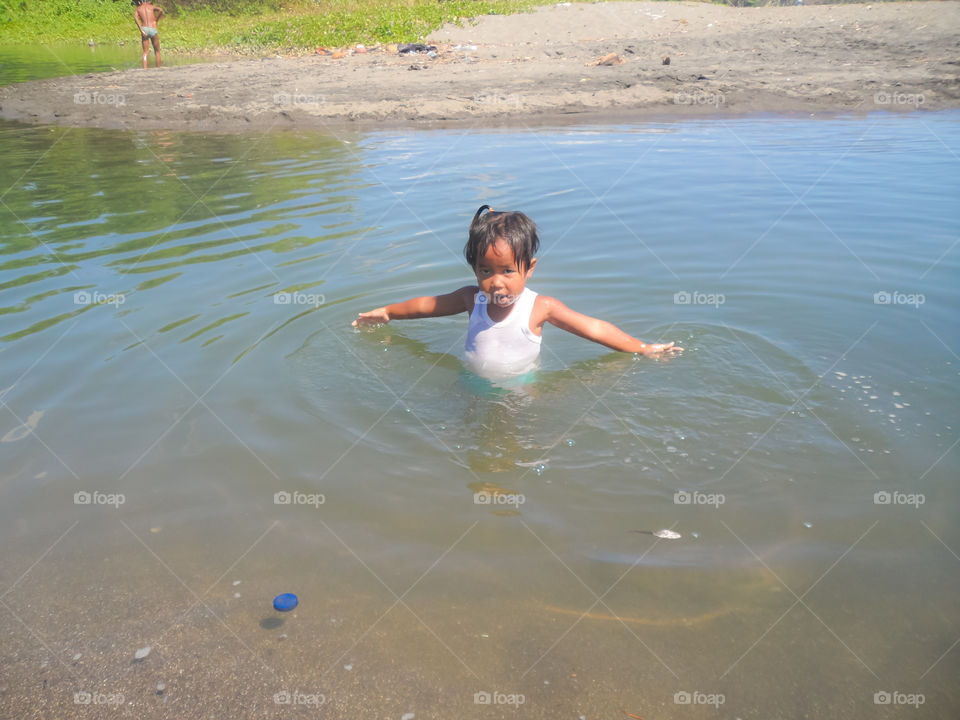 kid in the river