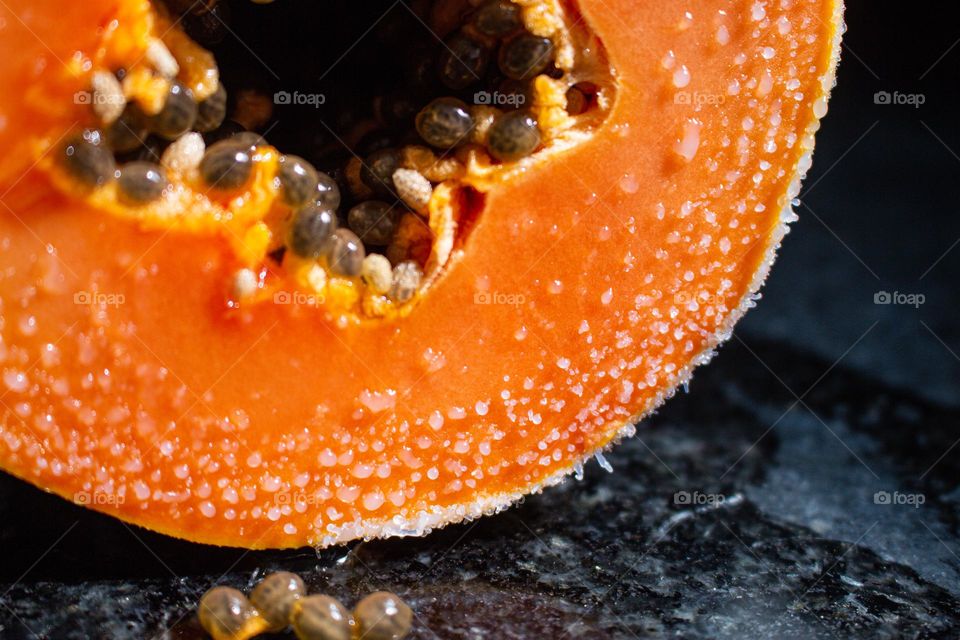 Piece of papaya up close.