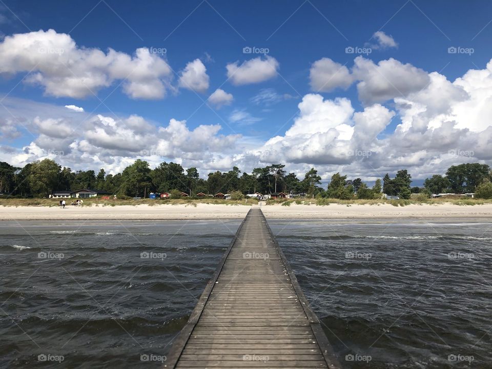 Walking the wharf to the beach