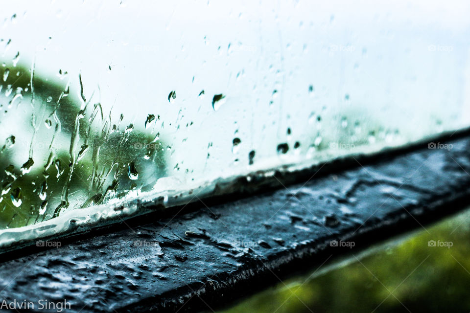 A Rainy Day. raindrops on a window in a lighthouse