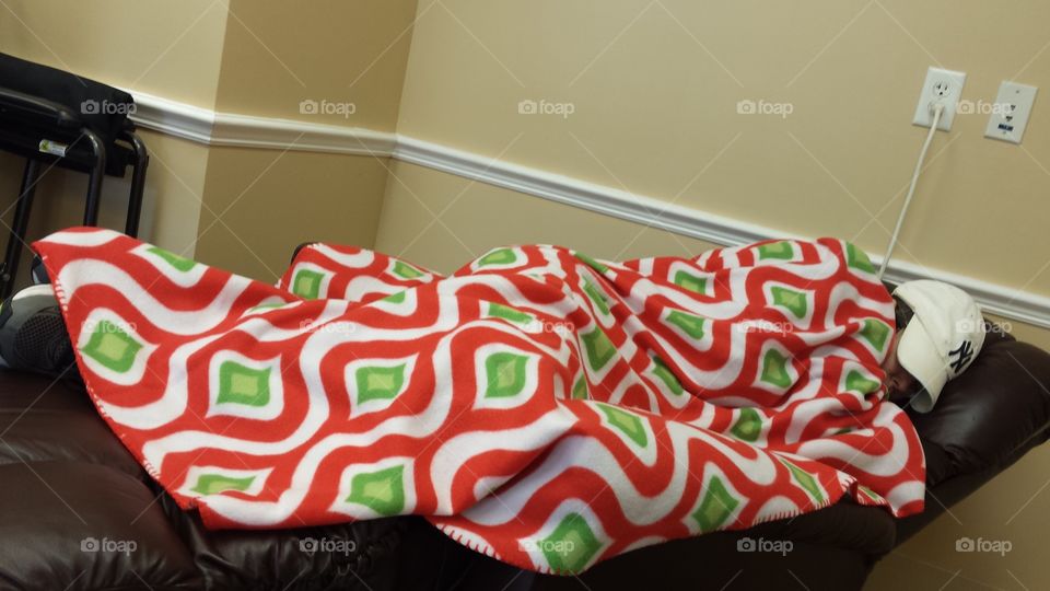 Caught her sleeping and looking like a burrito.