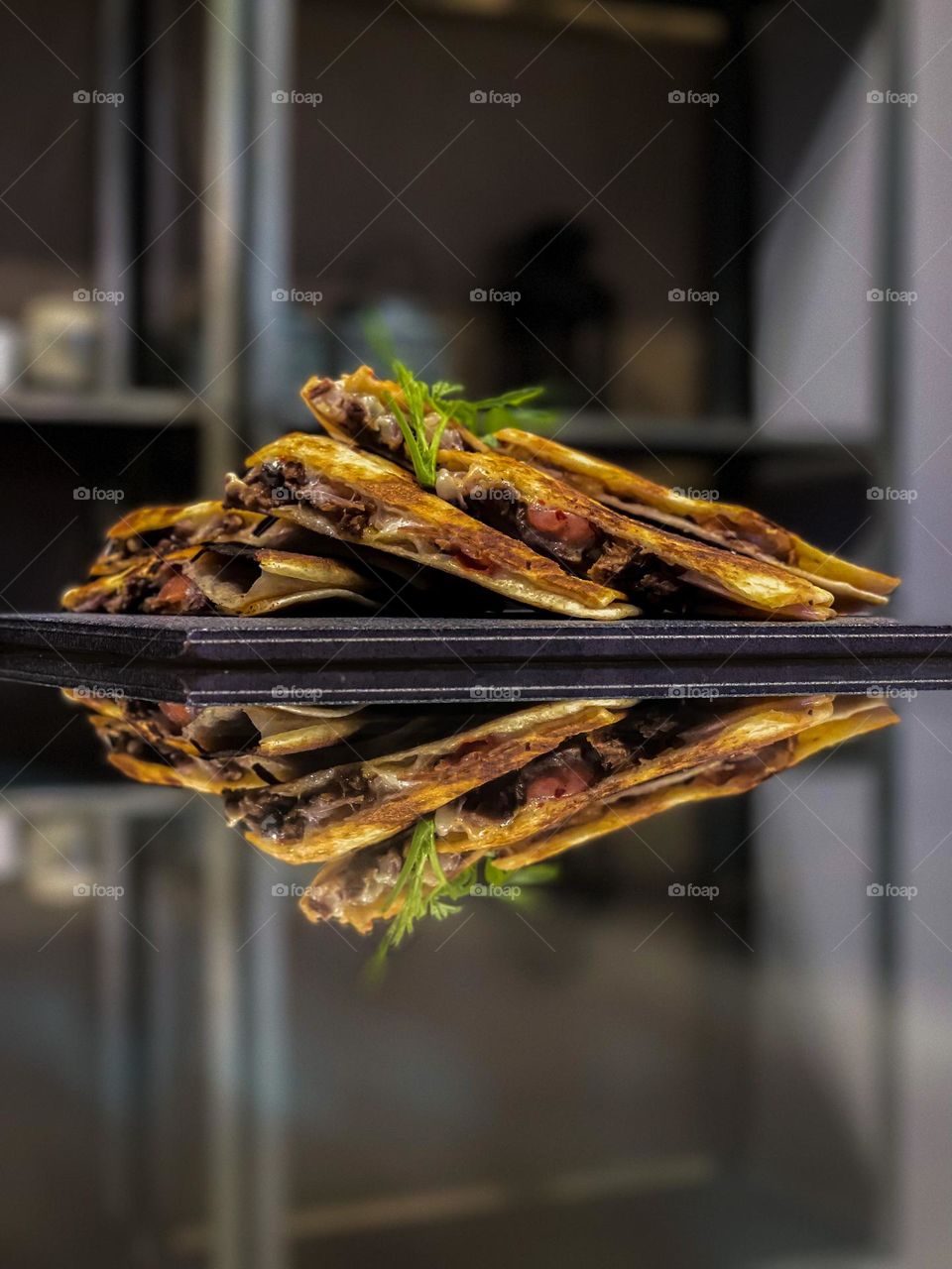 Beef quesadillas with reflection 