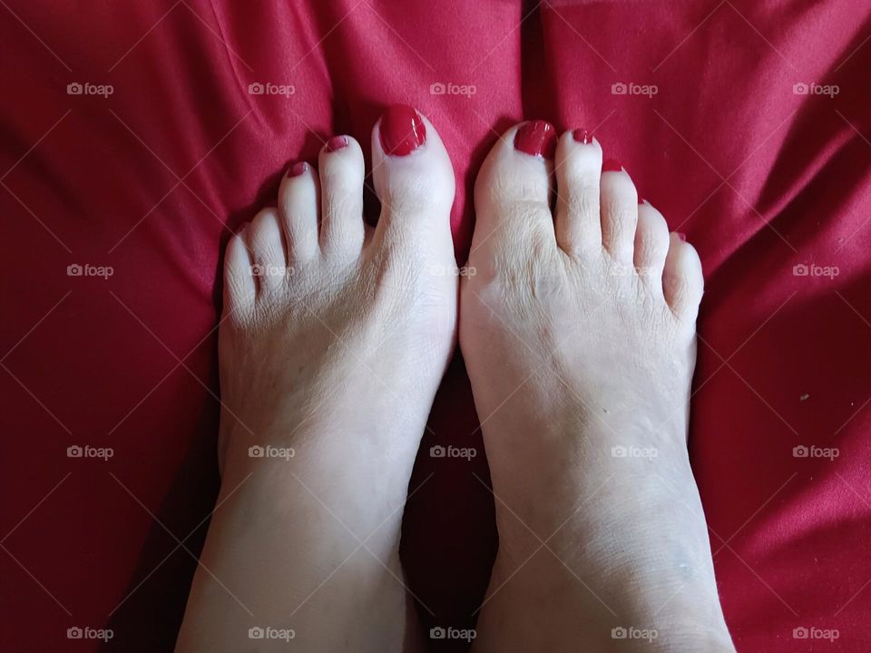 feet red background