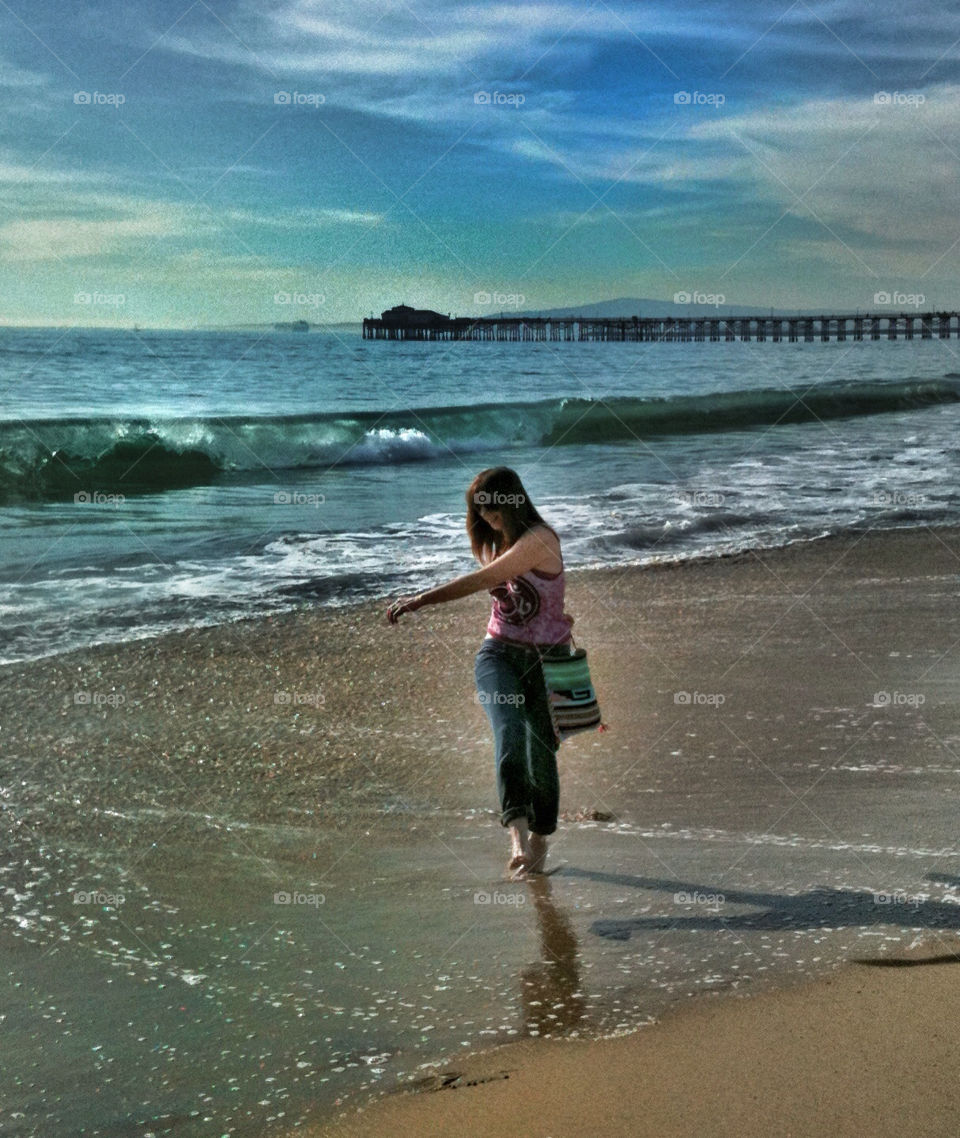 seal beach ocean happy woman by analia