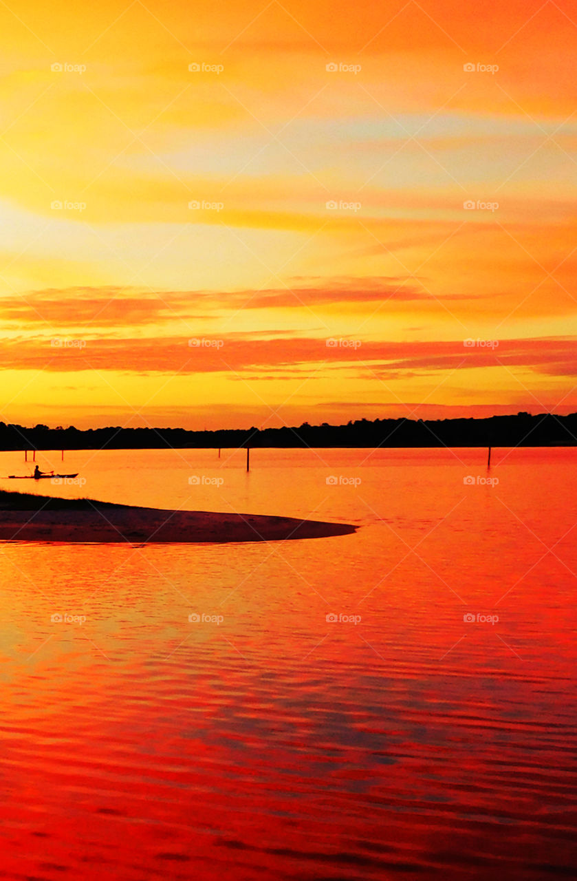 Alluring Sunsets! Like the meeting of two worlds - the known and the unknown. The sun is like a great big romantic, inspirational fire in the sky. Brilliant streaks of yellow, orange, gold, blue, pink and red overcome the blue and purple of the sky. The sky resembled a prism; all the colors blended perfectly together. It's as if the colors and intensity of the light is just enough to calm you. The brilliant orb of amber and tangerine sunk lower and lower in the sky until it dipped down into the horizon. My work is done for today. I'm not sure what tomorrow will bring, but I'll be prepared for it!