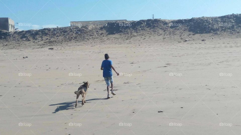 People walking with dog.