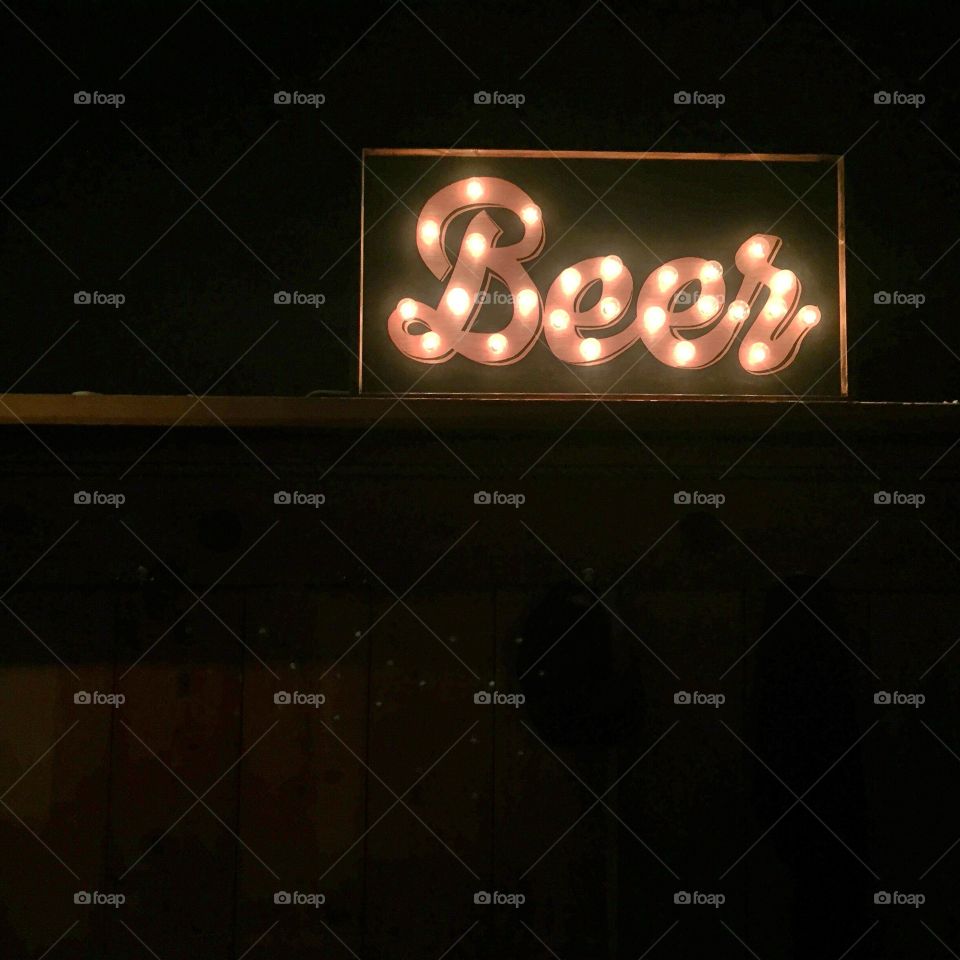 Beer sign in a bar