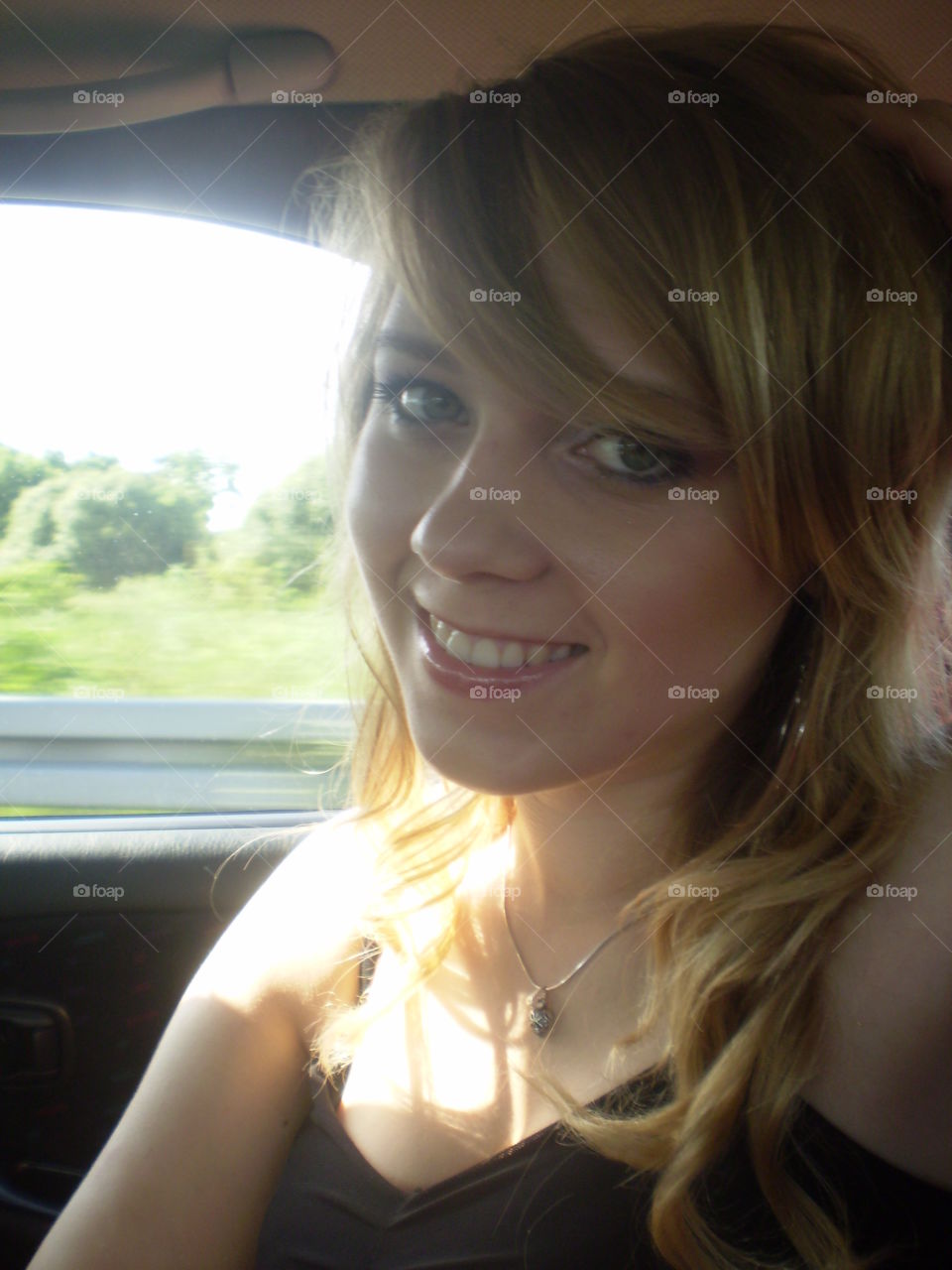 Close-up of woman in car