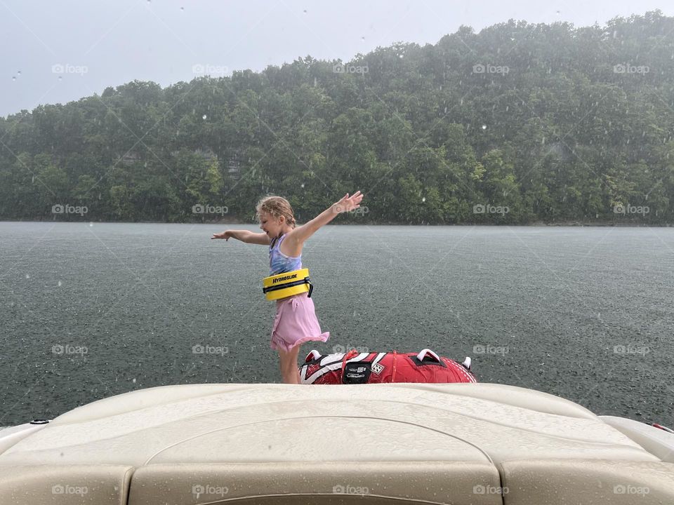 Enjoying the summer rain by dancing