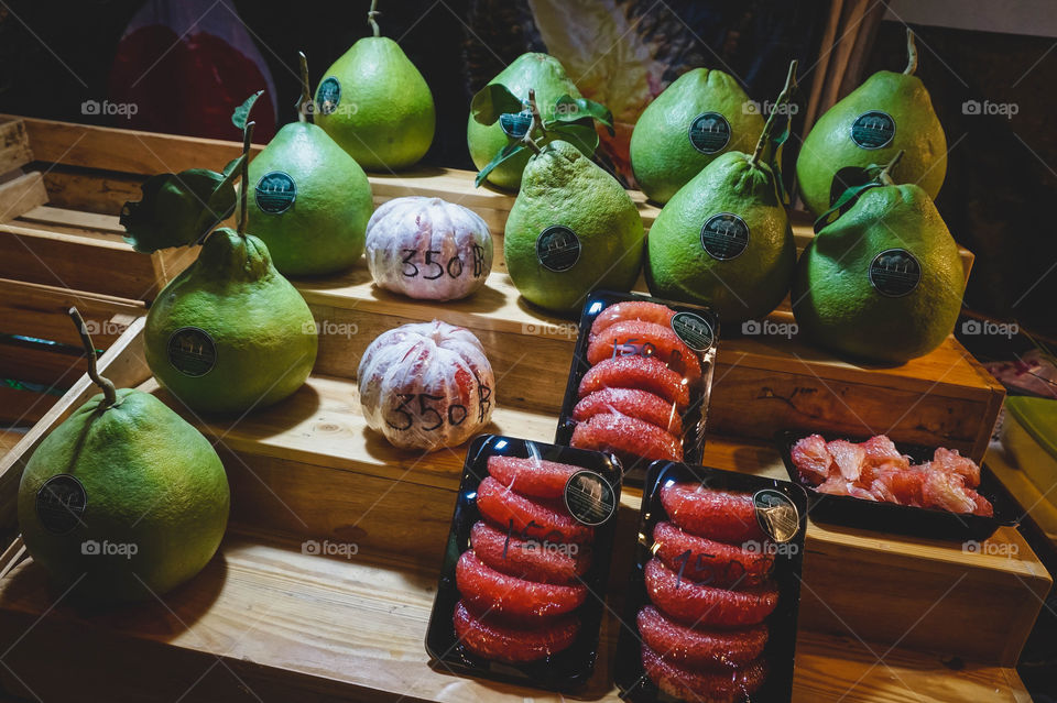 Volleyball sized pomelo at the Saturday night market in Chiang Mai, Thailand 