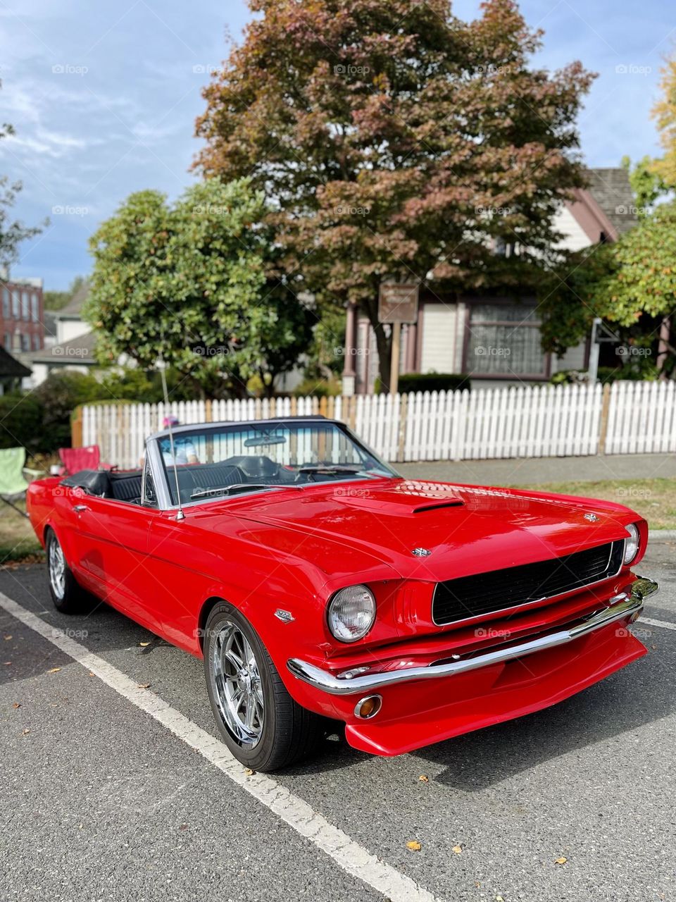 Red retro car at car show 