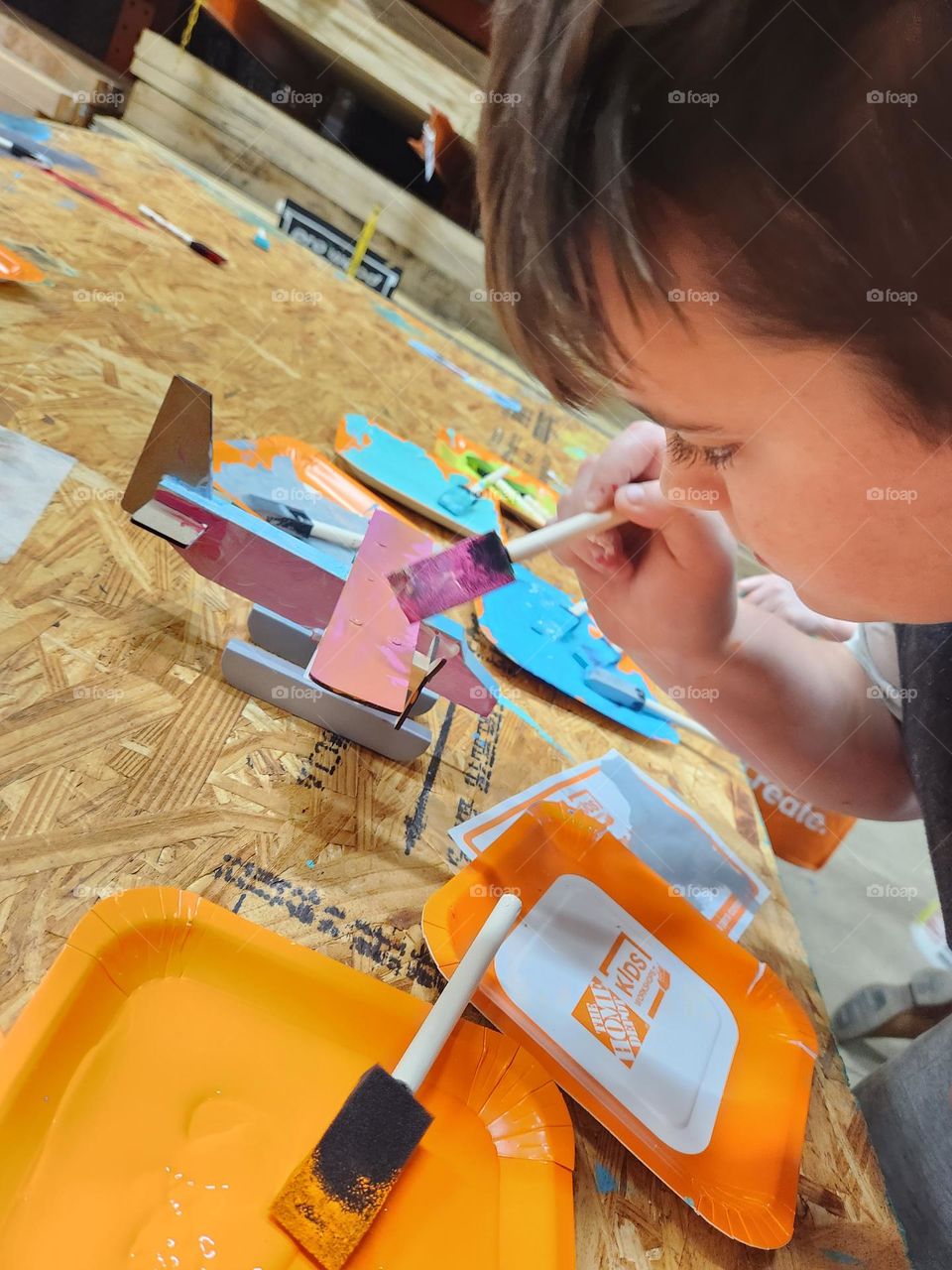 Home Depot Kid's Workshop painting airplane