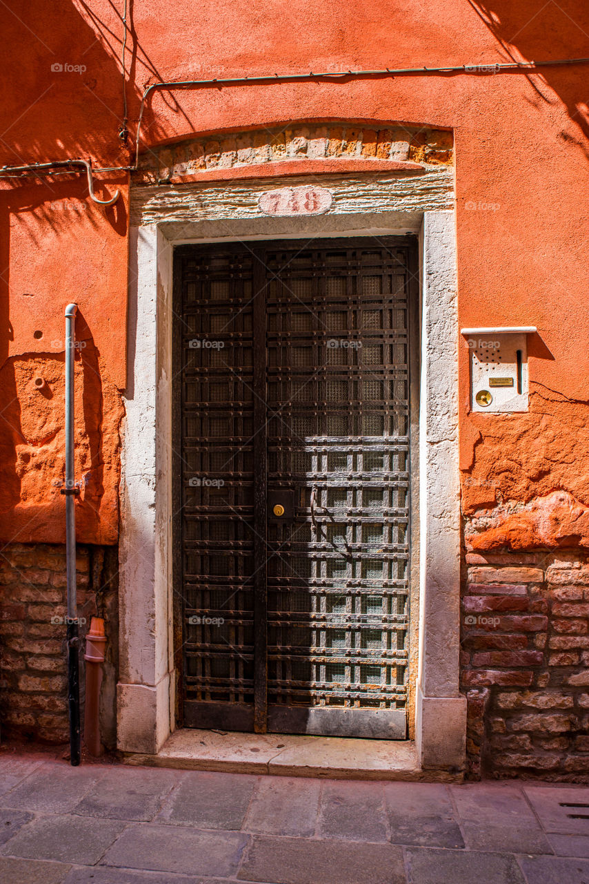 Dark old door in Venice