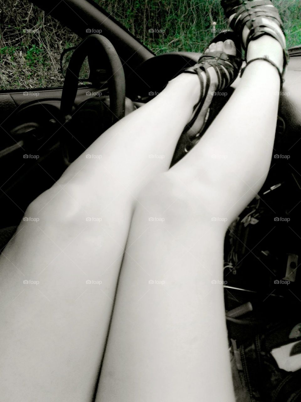 Black and white edgy style with a splash of green grass and long summer legs