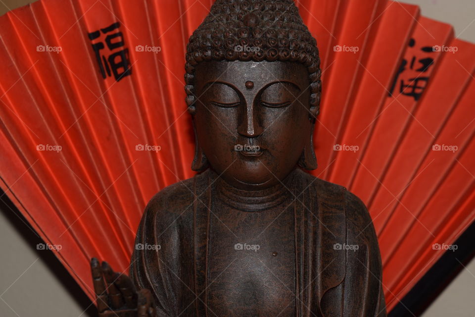 Buddha . carved wooden Buddha 