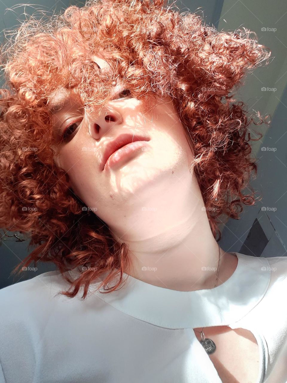 Curly hairstyle from red hair