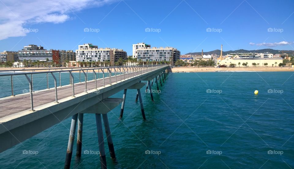 Pont del Petroli, Badalona. Bridge Oil - Pont del Petroli, Badalona, Spain, a place for walking over the sea