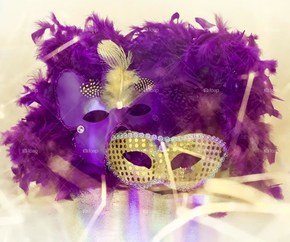 Purple and gold carnival masques.