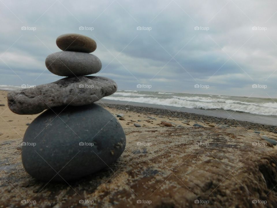 rock cairn at the lake. rock cairn at the beach
