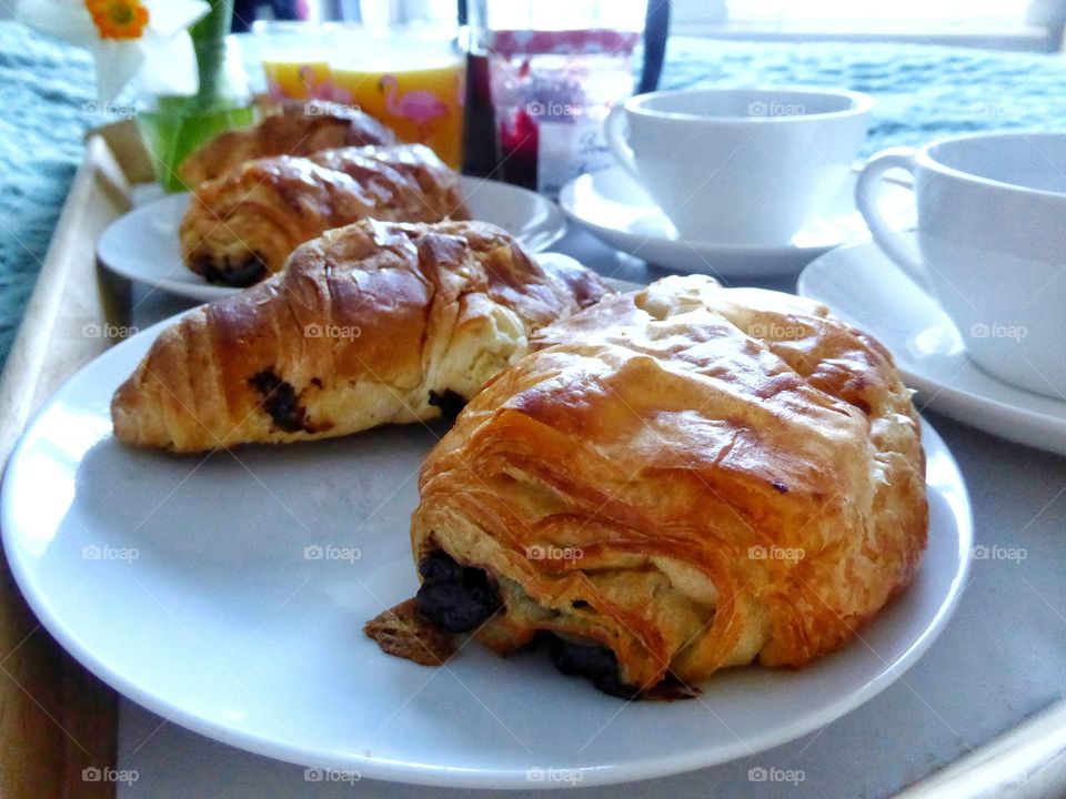 Close-up of croissants and coffee