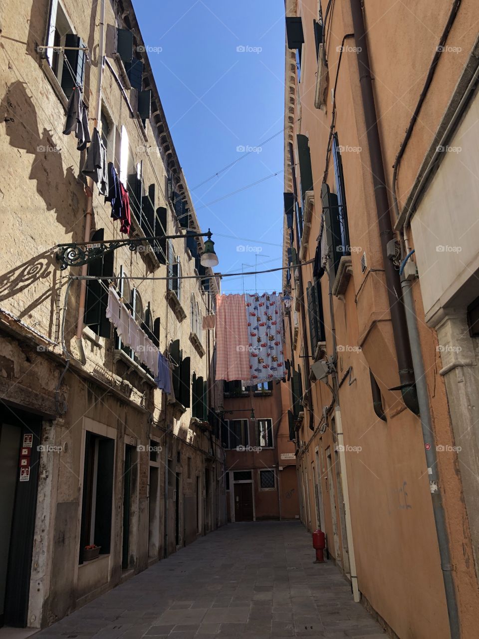 Washing hanging up in street in Venice italy October 2018
