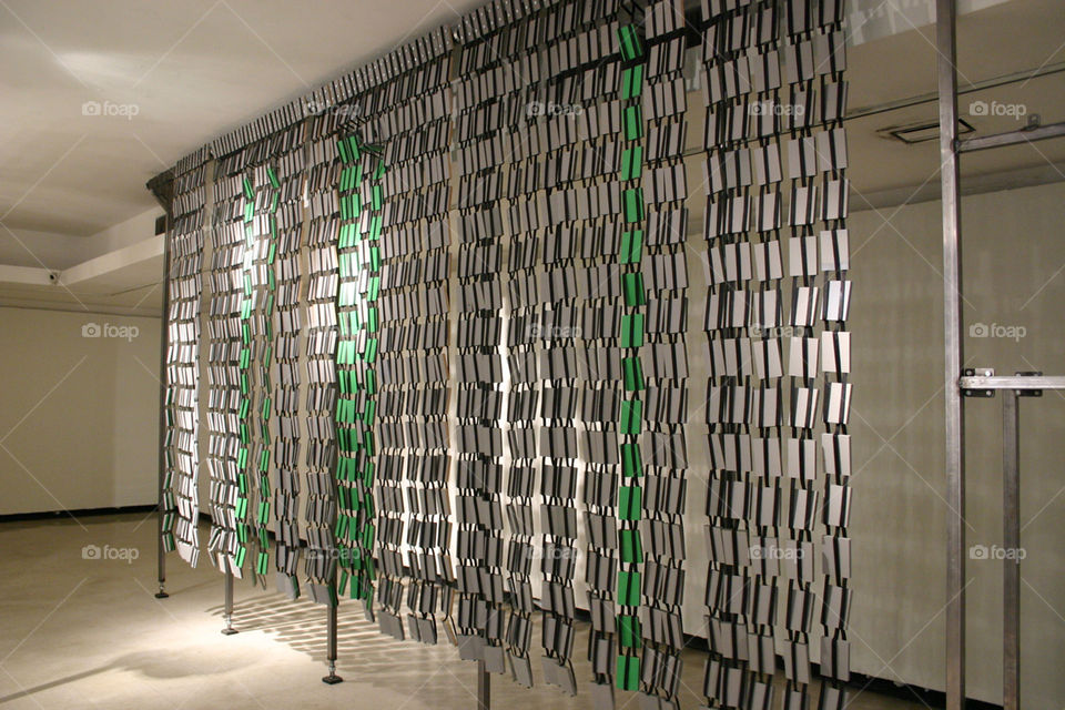 A sculpture I made called the "Flippin Wall".  It's made of rows and rows of Jacob ladder like toys.  It runs on a motor and gearbox from a washing machine that flips them back and forth.