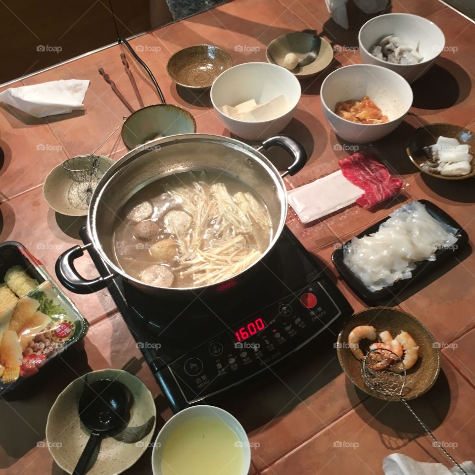 In winter we eat hot pot to keep us warm, because the homes have no central heating. 