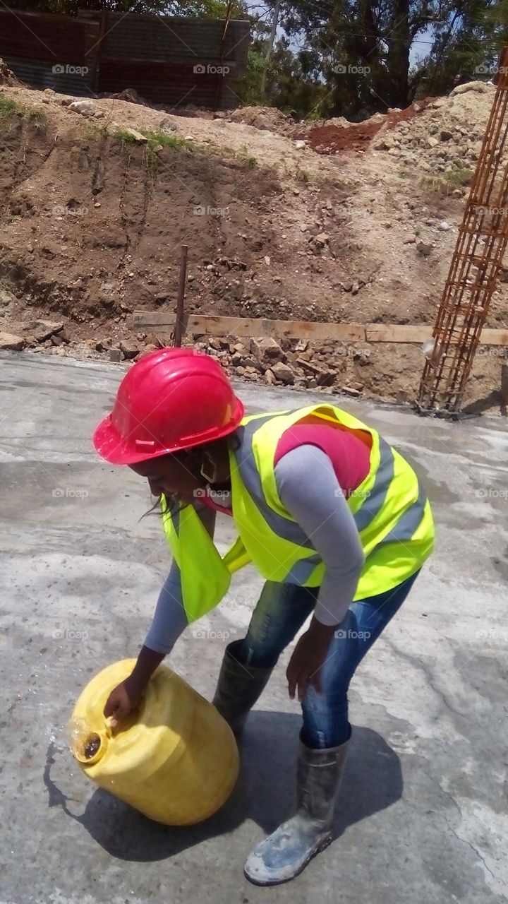 woman in a construction site!For What a man can do, a woman can do better !!