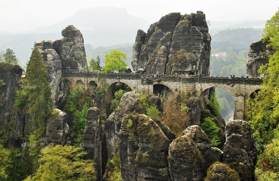 bastei - saxon switzerland national park view - old bridge and mountain peaks