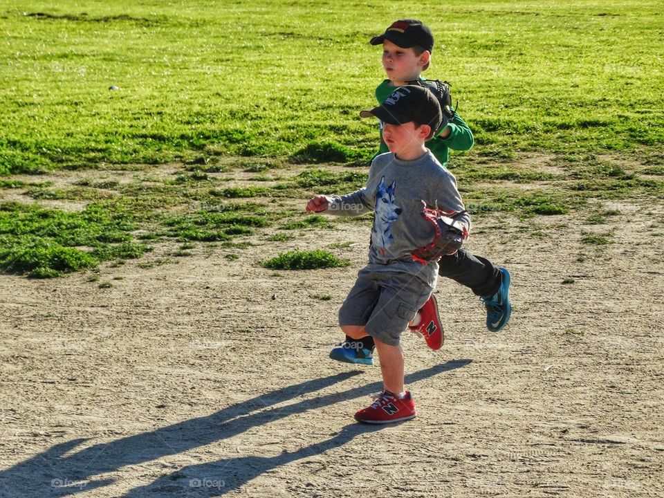 Young Kids Playing Baseball
